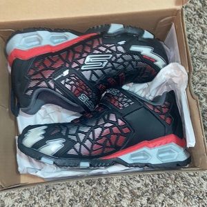 Brand new light up sketchers!